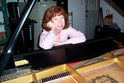 Jeanne at her Yamaha C3 grand piano